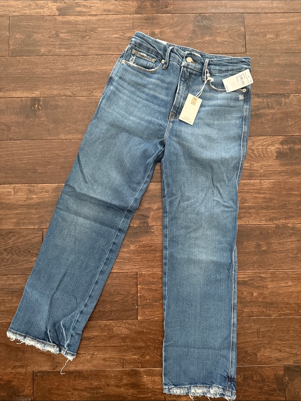 Good American Mid-Wash Straight-Leg Jeans with Raw Hem